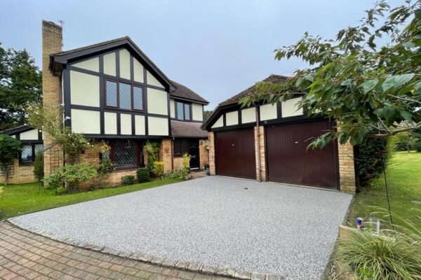 Charming house with landscaped garden and resin drive.