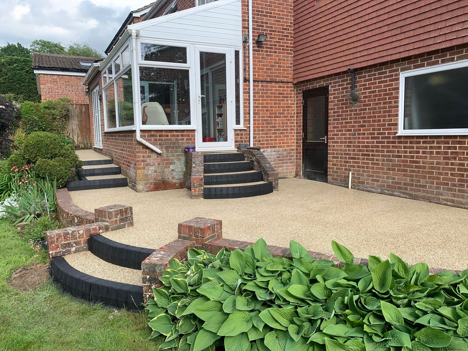 Resin patio area finished with smooth aggregate blend